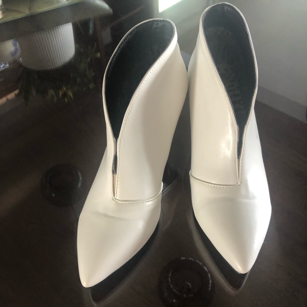 Never worn white booties.